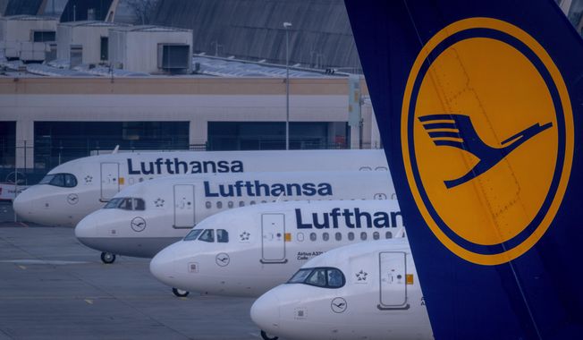 Lufthansa airplanes are parked at the airport in Frankfurt, Germany, Thursday, March 7, 2024. (AP Photo/Michael Probst) ** FILE **