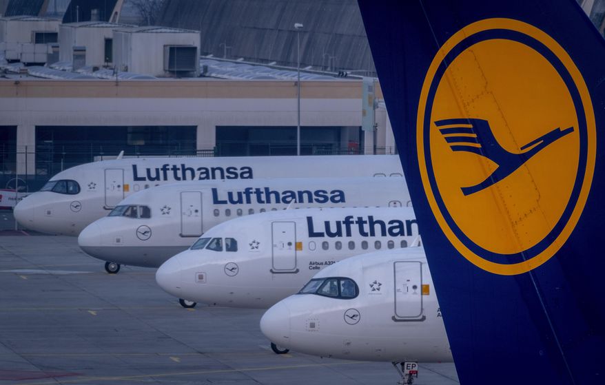 Lufthansa airplanes are parked at the airport in Frankfurt, Germany, Thursday, March 7, 2024. (AP Photo/Michael Probst) ** FILE **
