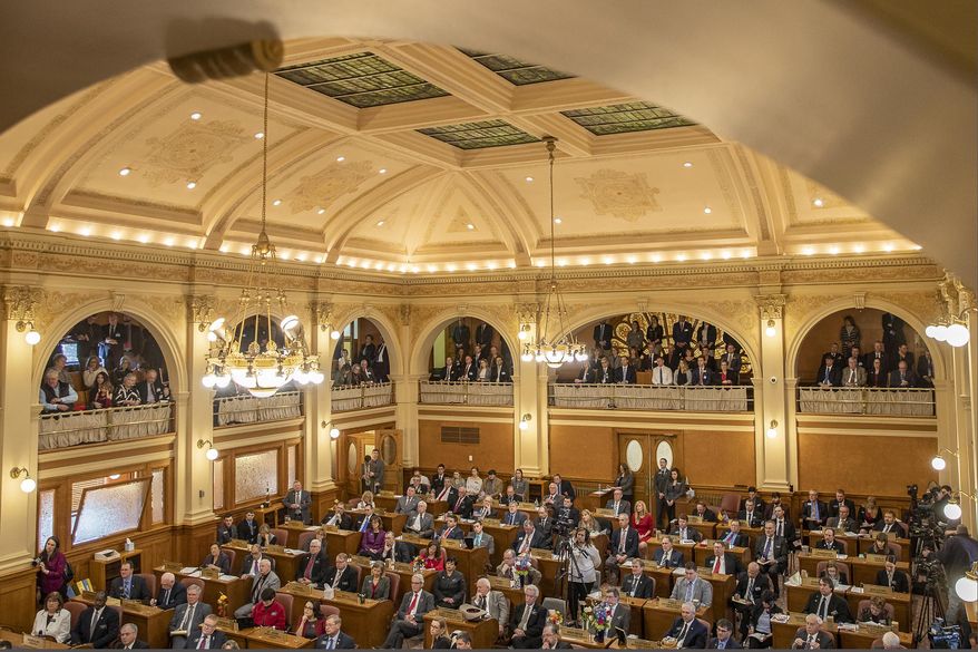 FILE - In this Jan. 8, 2019 photo, South Dakota state legislators listen while Gov. Kristi Noem delivers the State of the State address at the state Capitol in Pierre, S.D. Republican leaders are resisting calls to spell out in law the circumstances under which women can legally have abortions under “life of the mother” exceptions in states with strict bans. Lawmakers are suggesting instead that abortion providers just need more information about existing laws, or that they are knowingly avoiding legal procedures to make a political point. (Ryan Hermens/Rapid City Journal via AP, File)