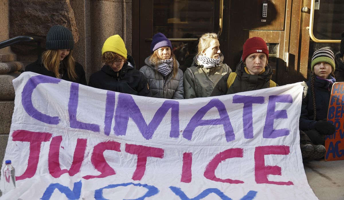NextImg:Climate activists including Greta Thunberg block entrance to the Swedish Parliament