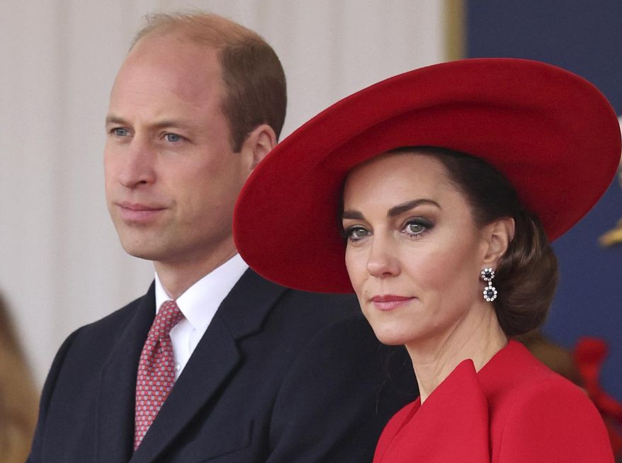 Britain's Prince William, left, and Britain's Kate, Princess of Wales, attend a ceremonial welcome for the President and the First Lady of the Republic of Korea at Horse Guards Parade in London, England on Nov. 21, 2023. Attention on Princess Kate has reached levels not seen since she married Prince William in a fairy-tale wedding in 2011. An admission from Kate that she altered an official family photo triggered a backlash. (Chris Jackson/Pool Photo via AP, File)