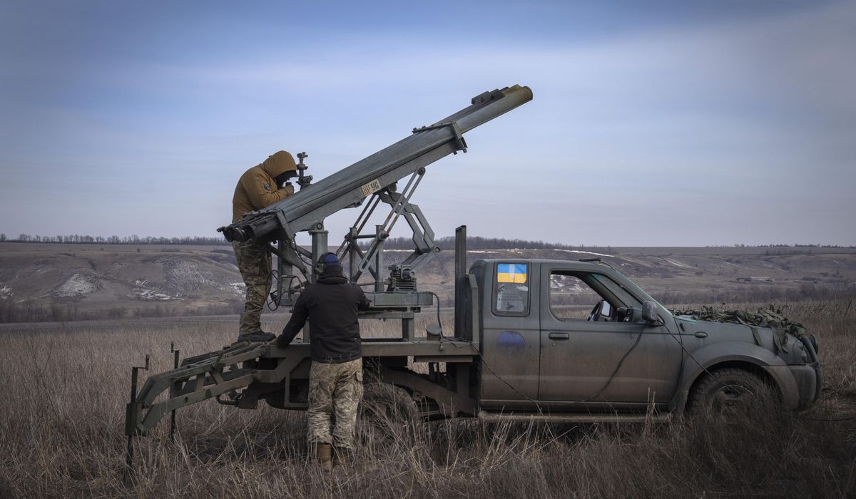 NextImg:Drones hit Russian oil depots, pro-Ukraine groups claim capture of Russian town