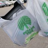 A customer exits a Dollar Tree store holding a shopping bag on Wednesday, May 11, 2022, in Jackson, Miss. Dollar Tree says it plans to close nearly 1,000 stores and moved to a surprise loss in its fiscal fourth quarter as the discount retailer took a $1.07 billion goodwill impairment charge. Shares dropped more than 7% before the market open on Wednesday, March 13, 2024. (AP Photo/Rogelio V. Solis) **FILE**