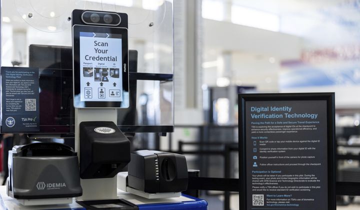 The Transportation Security Administration&#x27;s new facial recognition technology is seen at a Baltimore-Washington International Thurgood Marshall Airport security checkpoint, April 26, 2023, in Glen Burnie, Md. The U.S. government has started requiring migrants without passports to submit to facial recognition technology to take domestic flights under a change that prompted confusion Tuesday, March 12, 2024, among immigrants and advocacy groups in Texas. (AP Photo/Julia Nikhinson, File)
