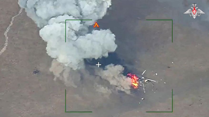 This photo taken from video released by Russian Defense Ministry Press Service on Wednesday, March 13, 2024, shows the destruction of a Ukrainian Armed Forces helicopter at the jump site at an undisclosed location in the Donetsk region, eastern Ukraine. (Russian Defense Ministry Press Service via AP) ** FILE **