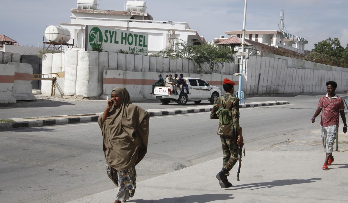 NextImg:Loud explosion is heard as Somali militant group says its fighters have attacked a hotel in capital