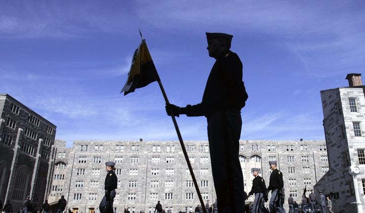 Cadets prepare to line up for lunchtime formation at the United States Military Academy at West Point, N.Y., Thursday, March 6, 2008. (AP Photo/Mike Groll, File)