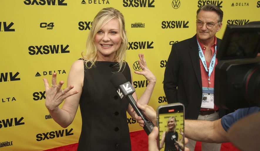 Kirsten Dunst arrives for the world premiere of &quot;Civil War,&quot; at the Paramount Theatre during the South by Southwest Film Festival, Thursday, March 14, 2024, in Austin, Texas. (Photo by Jack Plunkett/Invision/AP)