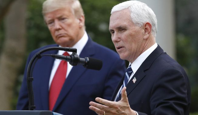 Then-President Donald Trump listens as then-Vice President Mike Pence speaks during a briefing at the White House, March 29, 2020, in Washington. Former President Trump said it doesn&#x27;t faze him that his former vice president isn&#x27;t backing him in his reelection bid. (AP Photo/Patrick Semansky, File)