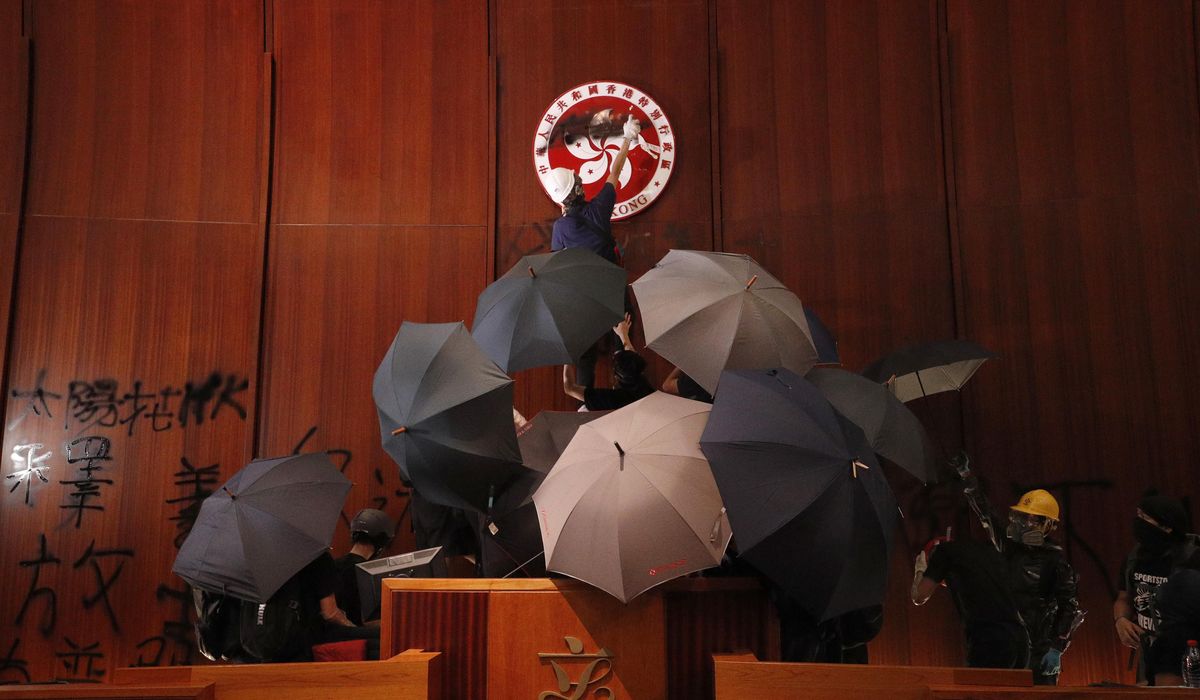 NextImg:Hong Kong jails 12 people over the storming of the legislature in 2019 protests
