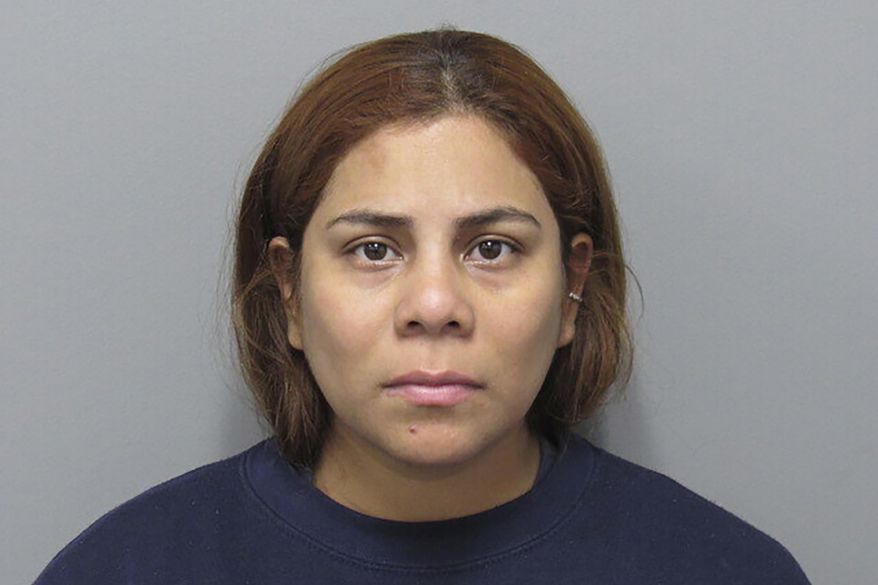 This booking photo provided by the Cuyahoga County, Ohio, Sheriff's Department shows Kristel Candelario, of Cleveland, Ohio. The Ohio mother whose 16-month-old daughter died after being left home alone in a playpen for 10 days last summer while she went on vacation was sentenced Monday, March 18, 2024, to life in prison with no chance of parole. (Cuyahoga County Sheriff's Department via AP, File)