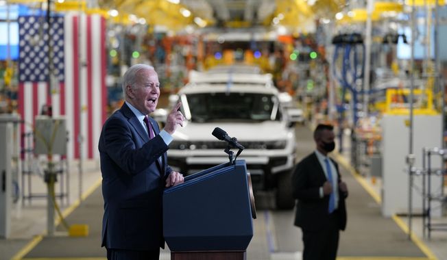 President Joe Biden speaks during a visit to the General Motors Factory ZERO electric vehicle assembly plant, Nov. 17, 2021, in Detroit. The Biden administration this week is expected to announce new automobile emissions standards that relax proposed limits in the next few years but reach the same strict standards outlined by the Environmental Protection Agency last year. (AP Photo/Evan Vucci) **FILE**
