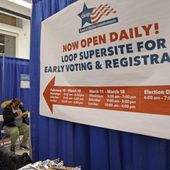 Voters fill out voter registration form at Chicago Loop Super Site in Chicago, Tuesday, March 19, 2024. Illinois residents will vote Tuesday to narrow Democratic and GOP candidate fields in key U.S. House races. (AP Photo/Nam Y. Huh)