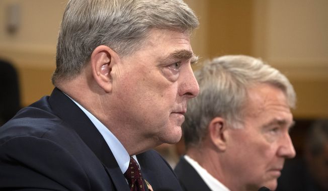 Retired Gen. Mark Milley, the former chairman of the Joint Chiefs of Staff, left, and retired Gen. Kenneth McKenzie, former commander of the U.S. Central Command, appear before the House Foreign Affairs Committee about the U.S. withdrawal from Afghanistan on Capitol Hill, Tuesday, March 19, 2024, in Washington. (AP Photo/Mark Schiefelbein)