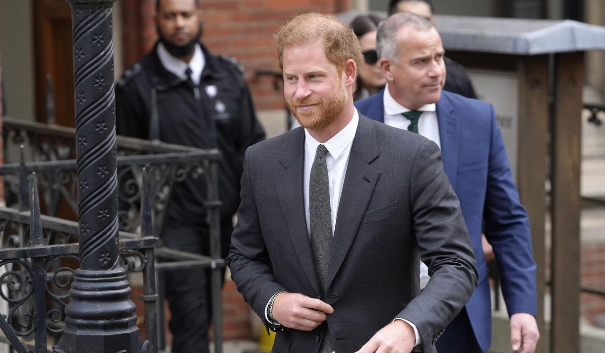 NextImg:Prince Harry says tabloids intercepted phone calls of mother, the late Princess Diana, and father