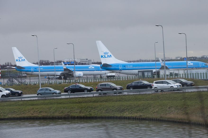 KLM airplanes sit in Schiphol Airport near Amsterdam, Netherlands, on Jan. 18, 2018. The Dutch government has systematically put the interests of the aviation sector above those of people who live near Schiphol Airport, one of Europe's busiest aviation hubs, a Dutch court ruled Wednesday, saying that the treatment of local residents amounts to a breach of Europe's human rights convention. (AP Photo/Peter Dejong, File)