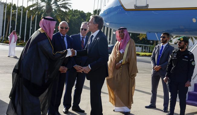 U.S. Secretary of State Antony Blinken walks arrives in Jeddah, Saudi Arabia, Wednesday, March 20, 2024. (Evelyn Hockstein, Pool Photo via AP)