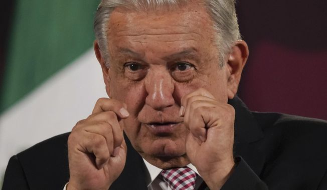 Mexican President Andres Manuel Lopez Obrador gives his daily, morning press conference at the National Palace in Mexico City, Friday, March 1, 2024. (AP Photo/Marco Ugarte)