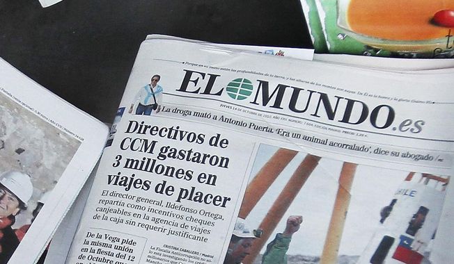 A front page of the El Mundo newspaper is displayed at the press stand in Madrid, Thursday Oct. 14, 2010. Russia&#x27;s Foreign Ministry says it issued the necessary documents for a Spanish journalist to stay in the country although the reporter claims he was forced to leave because his visa was not renewed. Xavier Colas of the newspaper El Mundo is the latest foreign journalist to have left Russia after visas were not continued. The cases come amid a crackdown on media that has intensified since Russia sent troops into Ukraine in February 2022. (AP Photo/Paul White, File)