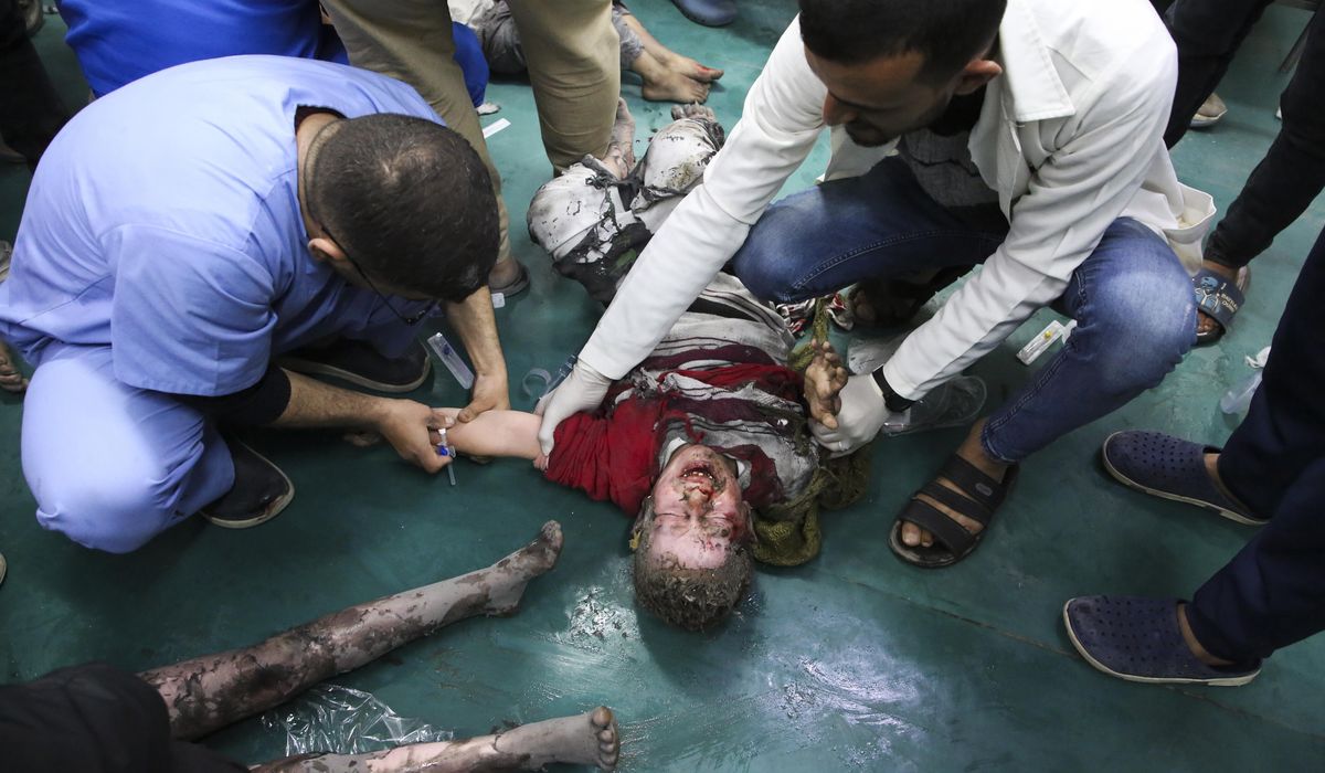 NextImg:Palestinians describe bodies and ambulances crushed in Israel’s ongoing raid at Gaza’s main hospital