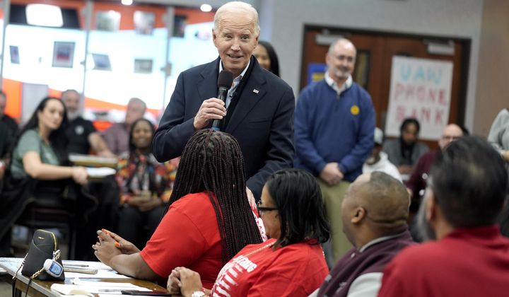 President Joe Biden addresses UAW members during a campaign stop, Feb. 1, 2024, in Warren, Mich. Former President Donald Trump is urging Republicans in Michigan to target Black voters in Detroit and other predominantly African American areas in the swing state, state GOP leaders said Monday, March 25. Both Biden and Trump will hotly contest Michigan, a state that flipped Democratic in 2020 and is widely seen as critical to both candidates&#x27; chances in November. (AP Photo/Evan Vucci) **FILE**