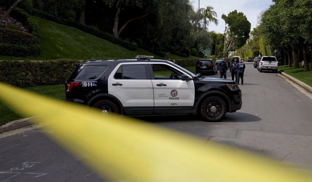 NextImg:USC student charged with murdering homeless man breaking into car