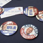 Buttons are displayed during a campaign event for Presidential candidate Robert F. Kennedy Jr., Tuesday, March 26, 2024, in Oakland, Calif. (AP Photo/Eric Risberg)