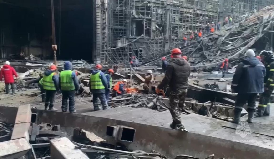 In this photo taken from video released by Russian Emergency Ministry Press Service on Tuesday, March 26, 2024, rescuers work in the burned concert hall after a terrorist attack on the building of the Crocus City Hall on the western edge of Moscow, Russia. Russia is still reeling from the attack Friday in which gunmen killed 139 people in the Crocus City Hall, a concert venue on the outskirts of Moscow. Health officials said about 90 people remain hospitalized, with 22 of them, including two children, in grave condition. (Russian Emergency Ministry Press Service via AP) **FILE**