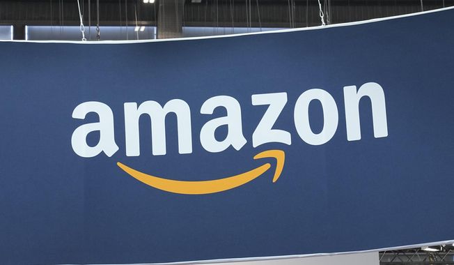 The Amazon logo is photographed at the Vivatech show in Paris, on June 15, 2023. Amazon says, Wednesday, March 27, 2024, its investing another $2.75 billion in the Artificial intelligence startup Anthropic, bringing its total investment in the company to $4 billion. The investment will give Amazon a minority stake in San Francisco-based Anthropic, which is a rival to OpenAI, the maker of the popular chatbot ChatGPT. (AP Photo/Michel Euler, File)