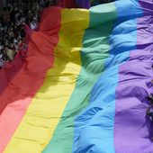 Participants hold a rainbow flag during a Pride Parade in Bangkok, Thailand, on June 4, 2023. Lawmakers in Thailand&#x27;s lower house of Parliament overwhelmingly approved a marriage equality bill on Wednesday, March 27, 2024, that would make the country the first in Southeast Asia to legalize equal rights for marriage partners of any gender. (AP Photo/Sakchai Lalit, File)