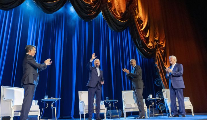 President Joe Biden, left center, and former presidents Barack Obama, right center, and Bill Clinton participate in a fundraising event with Stephen Colbert, left, at Radio City Music Hall, Thursday, March 28, 2024, in New York. (AP Photo/Alex Brandon)