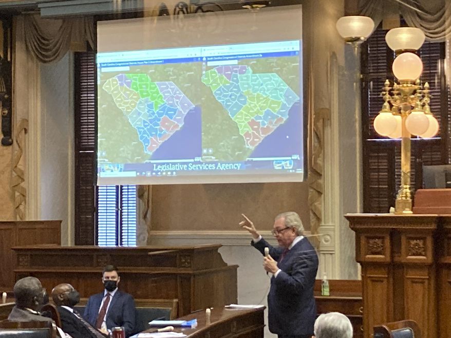 Sen. Dick Harpootlian, D-S.C., compares his proposed map of House districts drawn with 2020 Census data to a plan supported by Republicans on Jan. 20, 2022, in Columbia, S.C. A federal court ruled Thursday, March 28, 2024, that this year's congressional elections in South Carolina will be held under a map that it had already deemed unconstitutional and discriminatory against Black voters, with time running out ahead of voting deadlines, and the lack of a decision by the Supreme Court. (AP Photo/Jeffrey Collins, File)