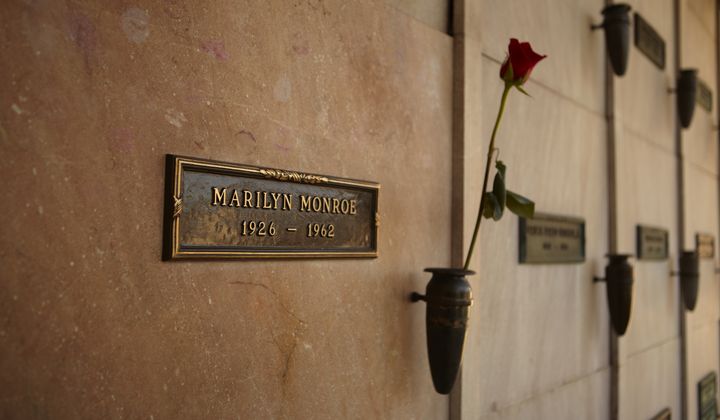 Marilyn Monroe&#x27;s Crypt with a fresh red rose at Westwood Memorial Park on March 2, 2012. 2012 is the 50th anniversary of Monroe&#x27;s death on 5th of August 1962. File photo credit: Sehenswerk via Shutterstock.