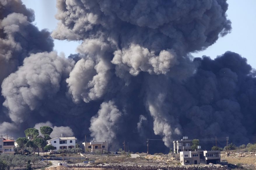 Black smoke rises from an Israeli airstrike on the outskirts of Aita al-Shaab, a Lebanese border village with Israel in south Lebanon, Saturday, Nov. 4, 2023. A war of words that has unfolded in Lebanon show longstanding schisms in the small country over Hezbollah, now amplified by the militant group's role in the Lebanon-Israel border clashes and by fears that an already crisis-hit Lebanon could be dragged into an all-out war. (AP Photo/Hussein Malla, File)