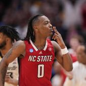 North Carolina State&#x27;s DJ Horne reacts after scoring a basket against Marquette during the second half of a Sweet 16 college basketball game in the NCAA Tournament in Dallas, Friday, March 29, 2024. (AP Photo/Tony Gutierrez)