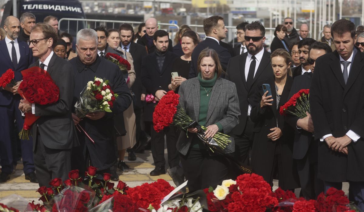 NextImg:Ambassadors lay flowers at site of Moscow concert hall massacre