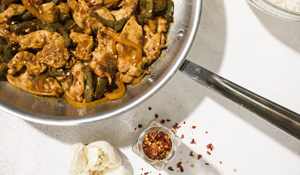 NextImg:Chicken breasts, bell peppers and umami-rich hoisin combine in this easy, flavorful stir-fry