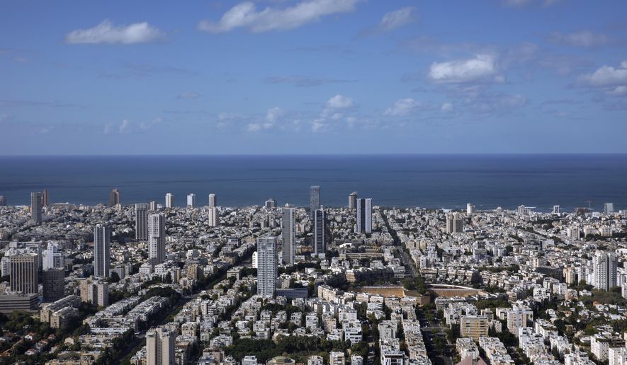 A general view shows the center of Tel Aviv, Israel, Thursday, Dec. 2, 2021. Prime Minister Benjamin Netanyahu has vowed to shut down Al Jazeera’s operations in Israel, calling it a “terror channel” that spreads incitement, after parliament passed a law clearing the way for the closure. (AP Photo/Oded Balilty, File)