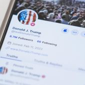 The Truth Social account for former President Donald Trump is seen on a mobile device, Wednesday, March 20, 2024, in New York. On Monday, April 1, less than a week after a flashy stock market debut, Trump&#x27;s social media company disclosed that it lost nearly $58.2 million in 2023. (AP Photo/John Minchillo, File)