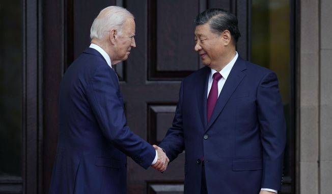 President Joe Biden greets China&#x27;s President President Xi Jinping at the Filoli Estate in Woodside, Calif., Nov, 15, 2023, on the sidelines of the Asia-Pacific Economic Cooperative conference. Biden and Xi spoke Tuesday in their first call since their November summit in California, Chinese state media reported. (Doug Mills/The New York Times via AP, Pool) **FILE**