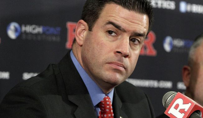 In this Jan. 31, 2012 file photo, Rutgers Athletic Director Tim Pernetti listens to a question during a news conference in Piscataway, N.J. The American Athletic Conference has hired former Rutgers athletic director Tim Pernetti as its next commissioner to replace the retiring Mike Aresco. (AP Photo/Mel Evans, File)