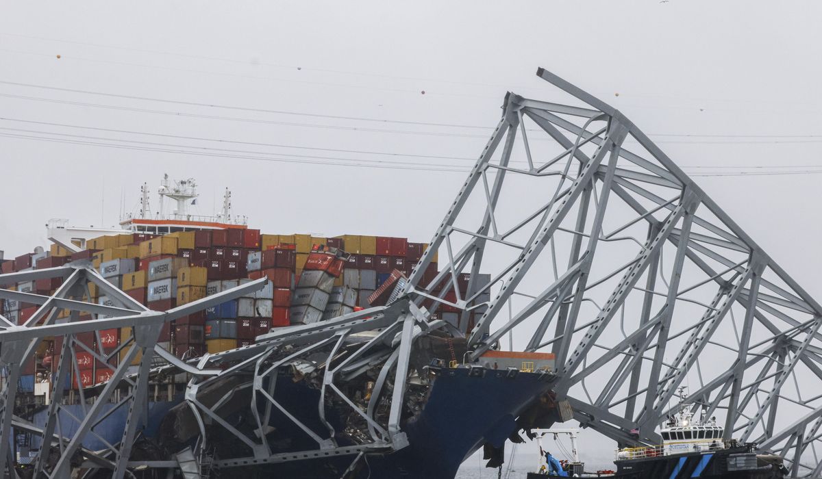 NextImg:Biden is touring collapsed Baltimore bridge where recovery effort has political overtones