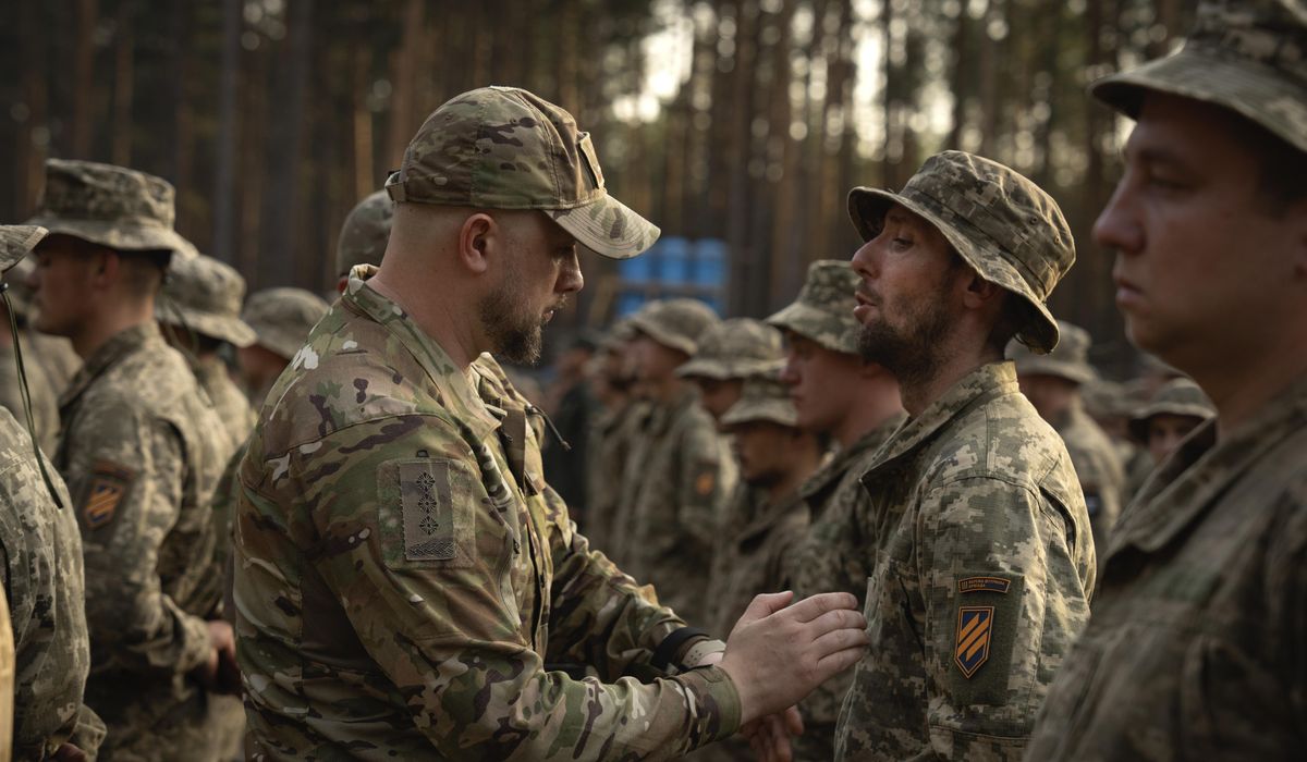 NextImg:Ukraine lowers its conscription age to 25 to plug a shortfall in troop numbers fighting Russia