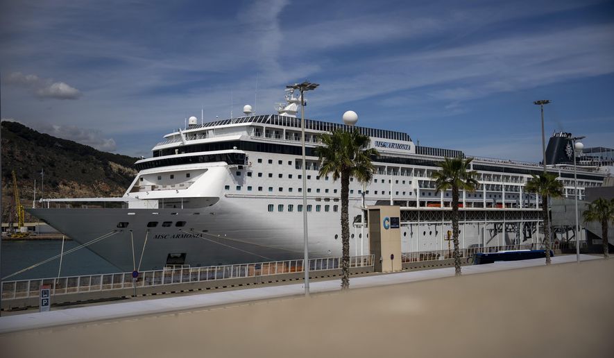 A view of the cruise ship MSC Armony moored in the port of Barcelona, Spain, Wednesday, April 3, 2024. Authorities said Wednesday that a group of 69 Bolivians are not being allowed to disembark from a cruise ship in the Spanish northeastern port of Barcelona because they lack valid documents to enter the European Union&#x27;s Schengen area. (AP Photo/Emilio Morenatti)