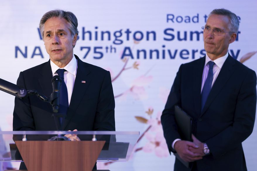 NATO Secretary General Jens Stoltenberg, right, and United States Secretary of State Antony Blinken address the audience during a ceremony marking the 75th anniversary of the signing of the North Atlantic Treaty, in Brussels, Wednesday, April 3, 2024. (Johanna Geron, Pool Photo via AP)