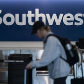 A traveler walks through the Southwest ticketing counter area at the Los Angeles International Airport in Los Angeles, April 18, 2023. (AP Photo/Jae C. Hong, File)