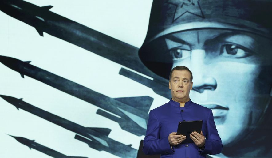 Dmitry Medvedev, deputy head of Russia's Security Council, speaks at a lecture at the 2024 World Youth Festival in Sochi, Russia, Monday, March 4, 2024. Medvedev later declared that if investigators prove Ukraine's involvement in the March 22 concert hall attack in Moscow, Russia should respond by deploying hit men to kill Ukrainian leaders. (Ekaterina Shtukina, Sputnik Pool Photo via AP)