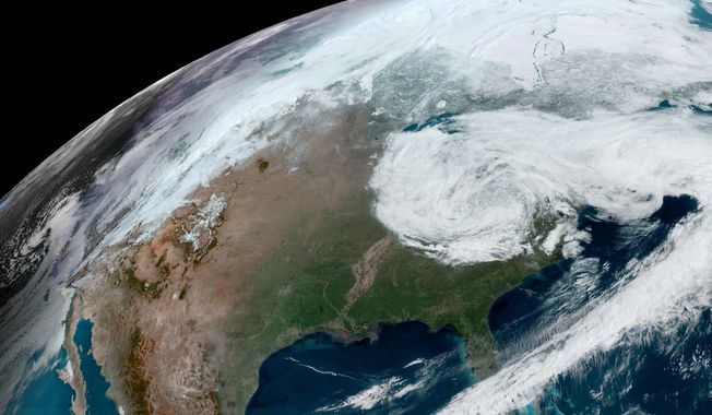 This satellite image provided by NOAA shows clouds over North America on Thursday, April 4, 2024. (NOAA via AP)
