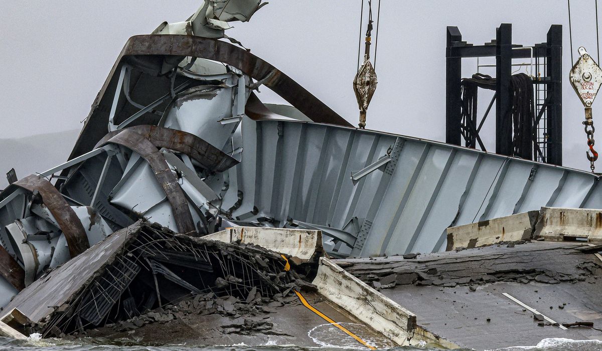 NextImg:Biden tours Key Bridge wreckage in Baltimore, vows a swift rebuild to reopen busy port