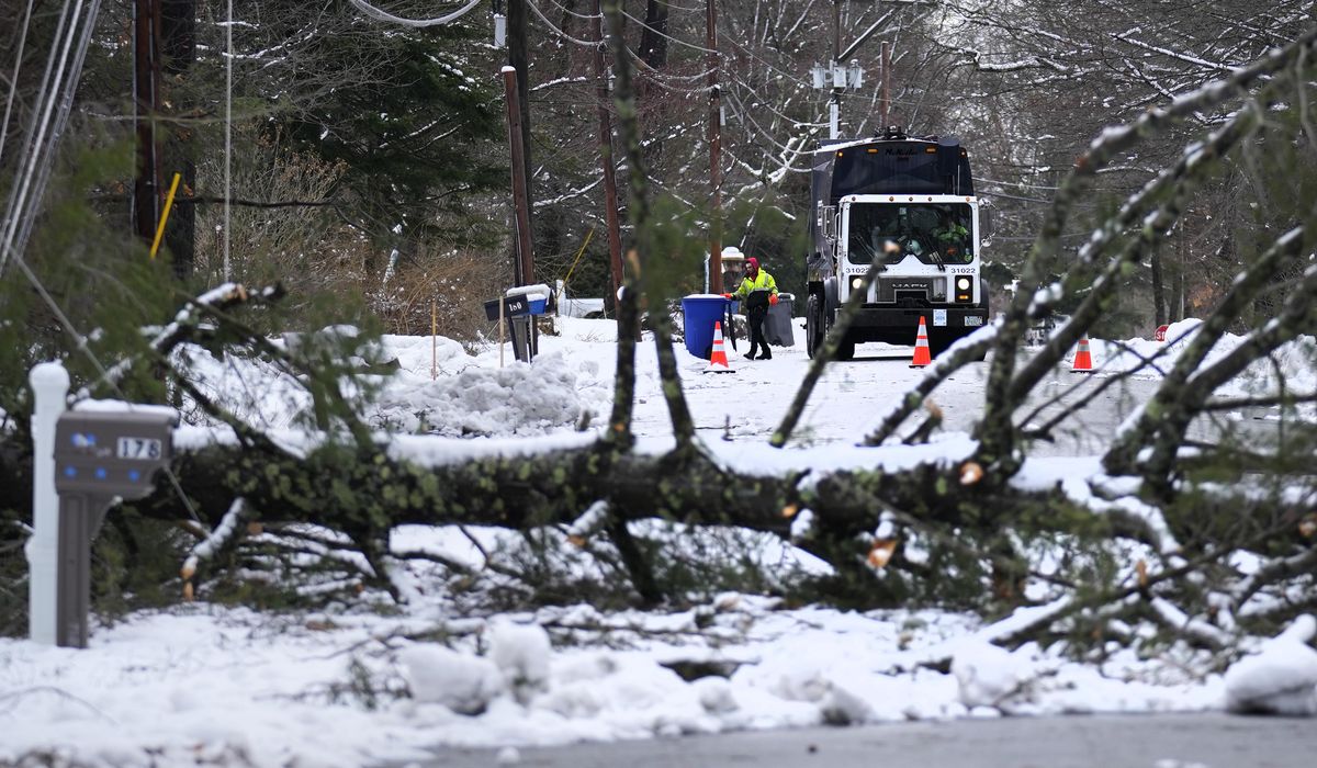 NextImg:Tens of thousands still without power following powerful nor’easter in New England